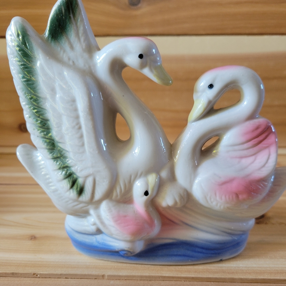 Porcelain swans